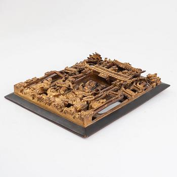 A wooden panel, China, late Qing dynasty.