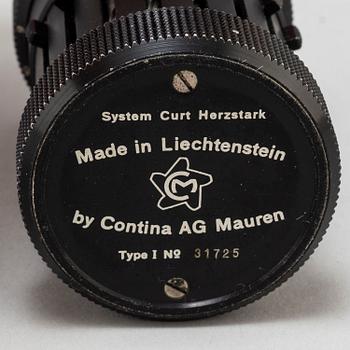 A 'Curta, Type I' calculator developed by Curt Herzstark, Contina AG Mauren, Lichtenstein, designed in 1947.