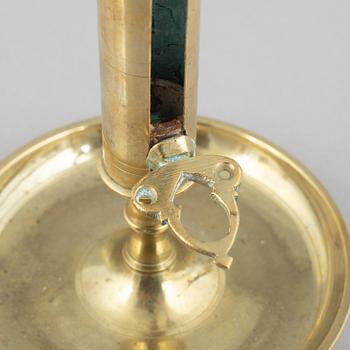 Six brass night candle sticks, 19th century.