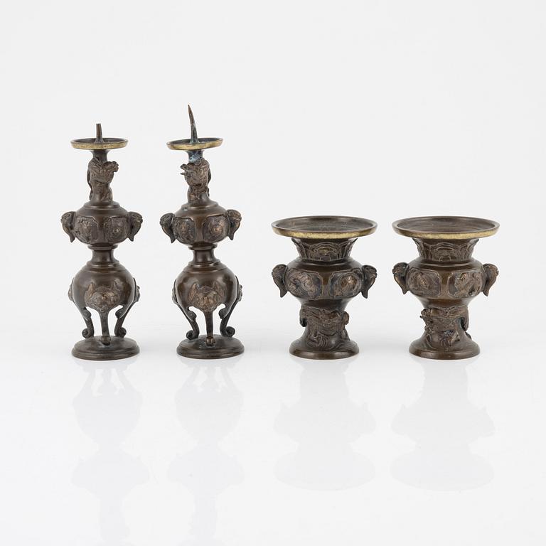 A pair of Japanese bronze candleholders / censers and a pair of decorative vases, Meiji (1868-1912).