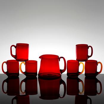 A Reijmyre jug and 6 glasses of ruby glass, third quarter of the 20th century.