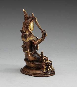 A Sino-tibetan gilt copper figure of a Bodhisattva, Qing dynasty, 19th Century.