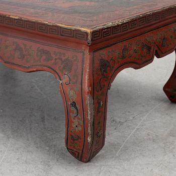 A Chinese red lacquered table, first quater of the 20th century.