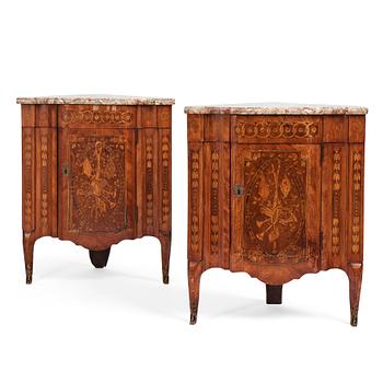 5. A pair of Louis XVI corner cupboards by Francois Gaspard Teunè (master in Paris from 1766), 18th century.