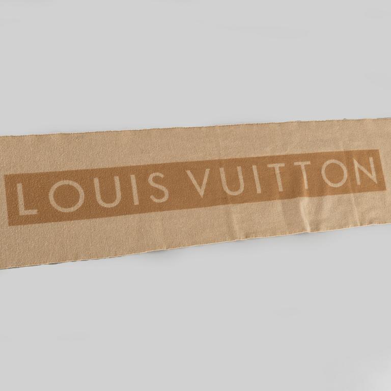 A cashmere scarf by Louis Vuitton.