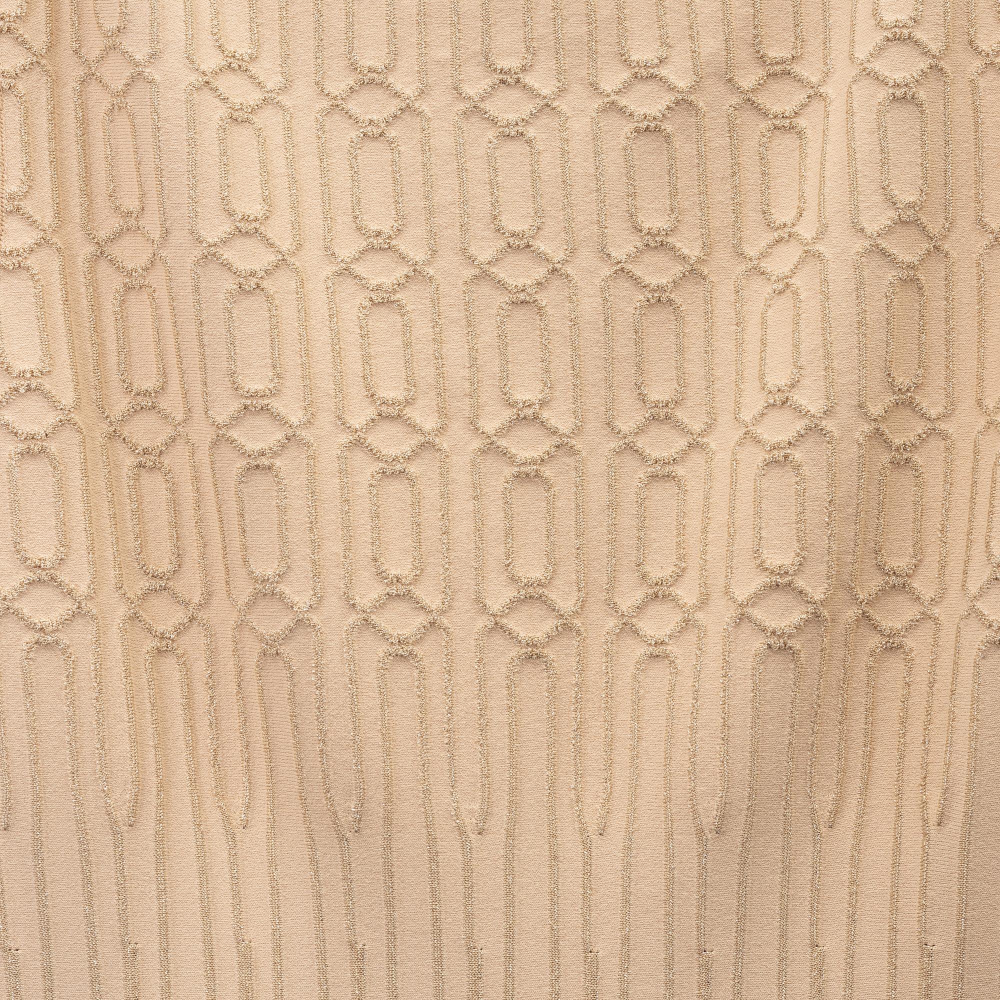 Alaïa, a beige patterned dress, size 36.