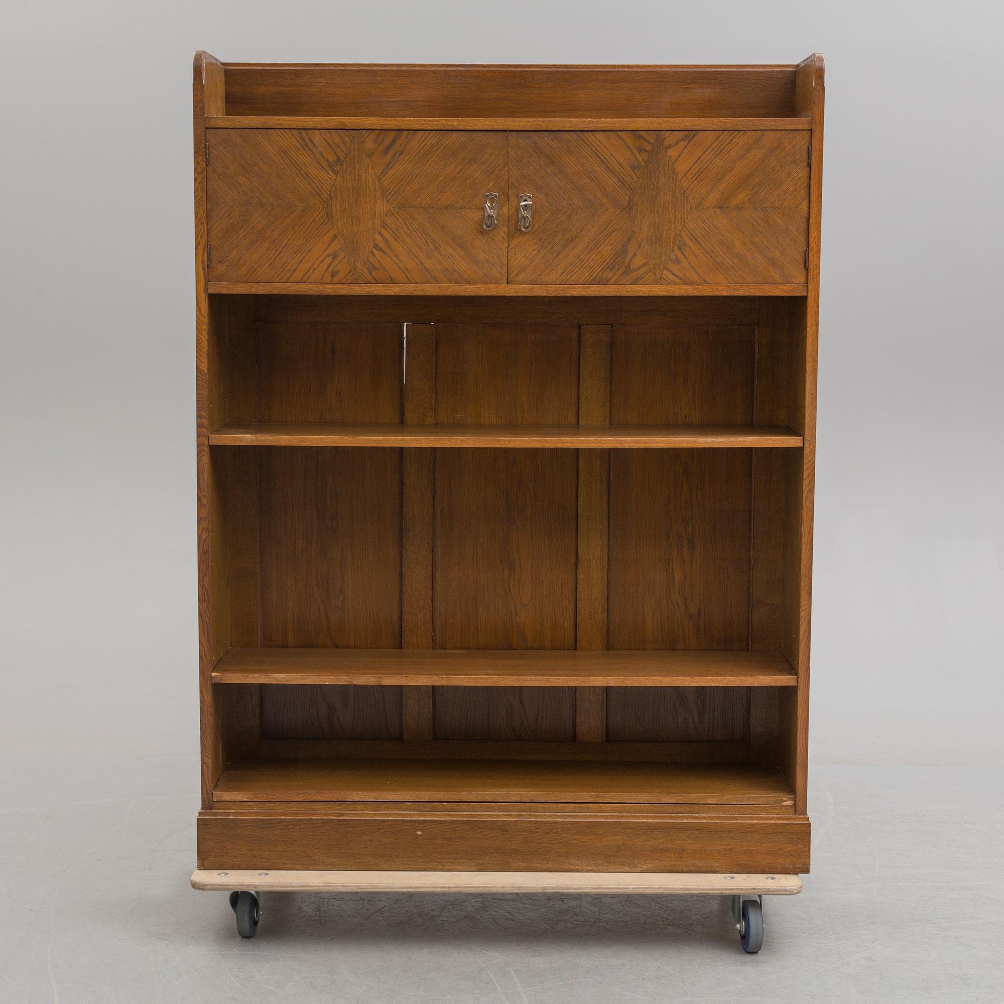 An early 20th century bookcase /  cabinet.