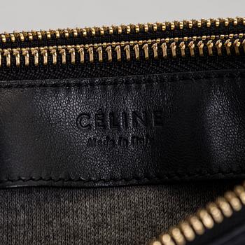 Céline, a black leather 'Trio Small' bag.