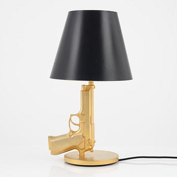 Philippe Starck, a 'Gun bedside Lamp' table light, Flos, Italy.
