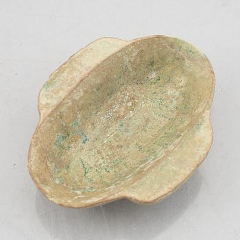 A Chinese glazed ceramic dish, Han dynasty (206 B.C-220 A.D.).