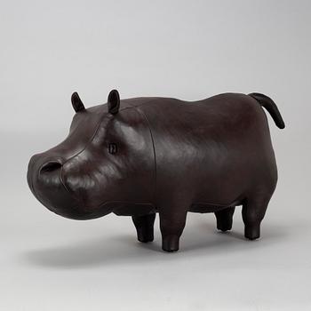 A leather footstool by Dimitri Omersa & Co.