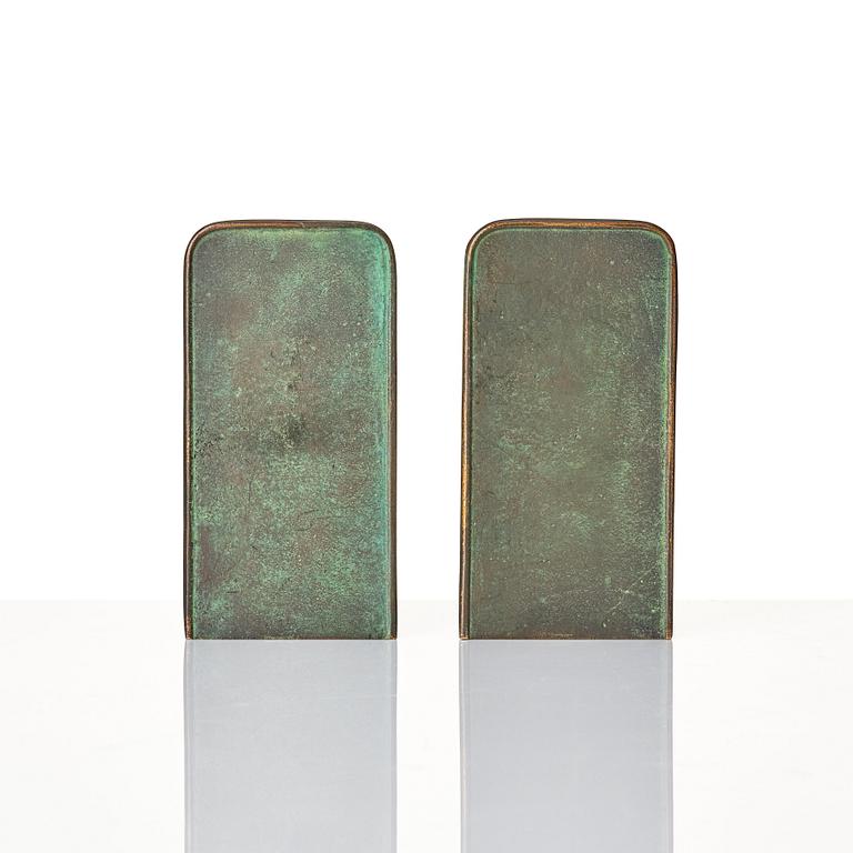 Carl-Einar Borgström, a pair of patinated bronze bookends, Ystad Brons, 1930-40s.