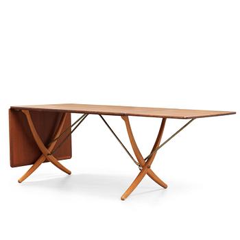 Hans J. Wegner, a teak and beech dinner table by Andreas Tuck, Denmark 1950-60's.