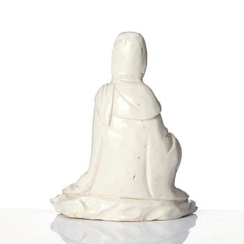 A blanc de chine figure of a seated Guanyin, 18th/19th century.