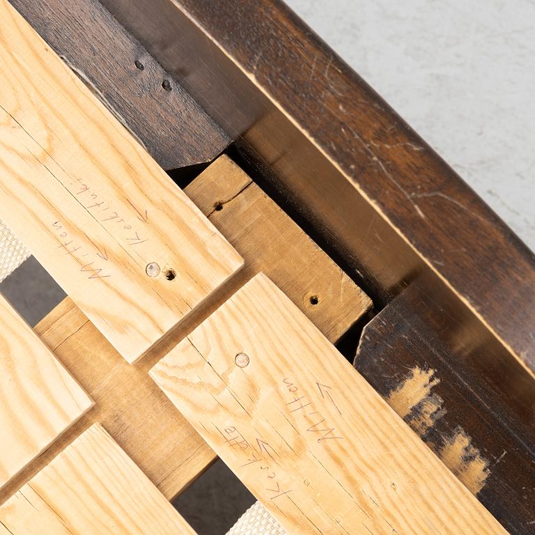 A rococo style bed frame, around 1900.