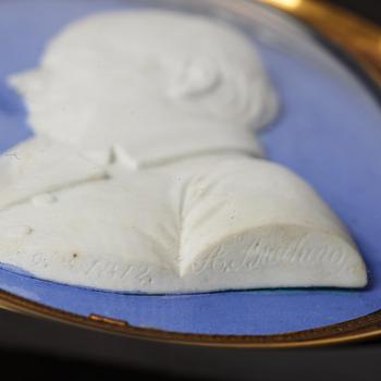 A pair of Sèvres biscuit plaques by Alexandre Brachard (1775-1843), dated 1812.