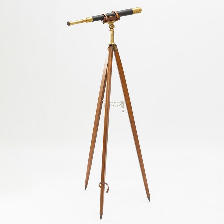 A 20th century telescope on a tripod.