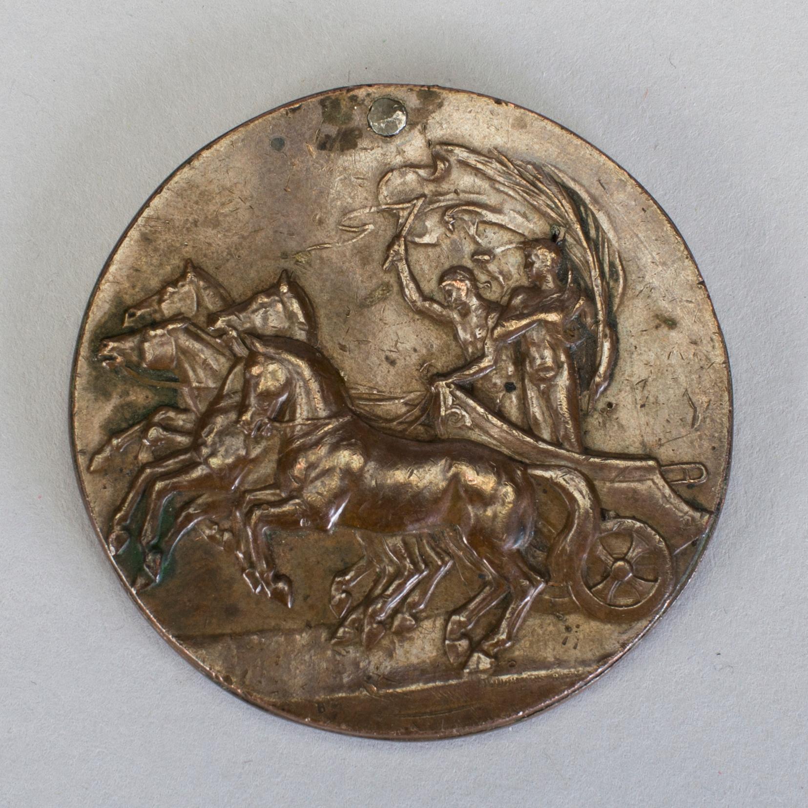 A bronze participant medal from the 1912 olympic games in Stockholm.
