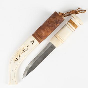 A reindeer horn knife by Paulus Utsi, signed.