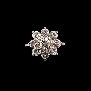 SORMUS, briljanttihiottuja timantteja 1.65 ct. Keskikivi n. 0.35 ct. 14K valkokultaa. Koko 17+, paino 5,1 g.