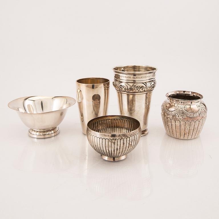 A set of five silver vases and bowls 20th century.