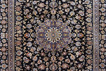 A carpet, Kashan, ca 420 x 296 cm.