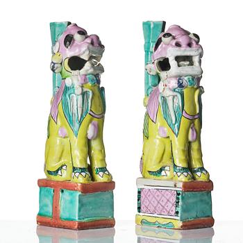 A pair of famille rose 'buddhist lion' joss stick holders, Qing dynasty, circa 1800.