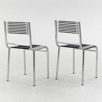 A pair of Rene Herbst chromium-plated, "Sandows" chairs, late 20th century.