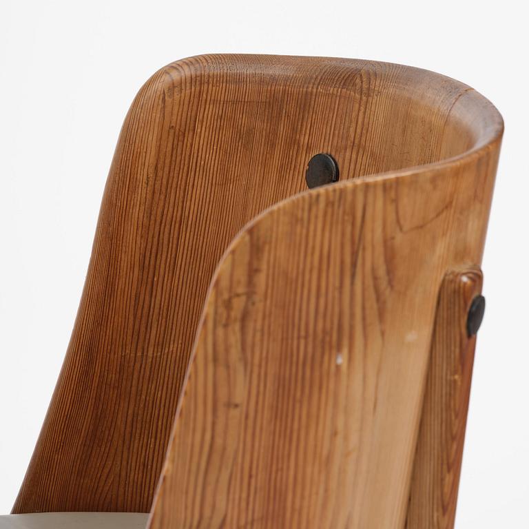 Axel Einar Hjorth, a pair of stained pine "Lovö" armchairs, Nordiska Kompaniet, Sweden, 1930s.