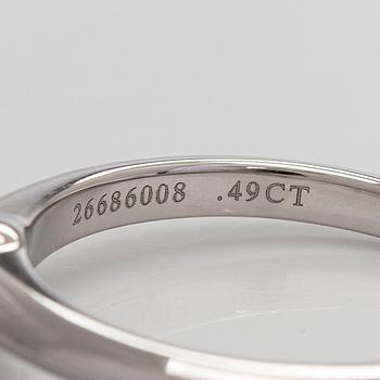 Tiffany & Co, a platinum solitaire ring with a brilliant-cut diamond.