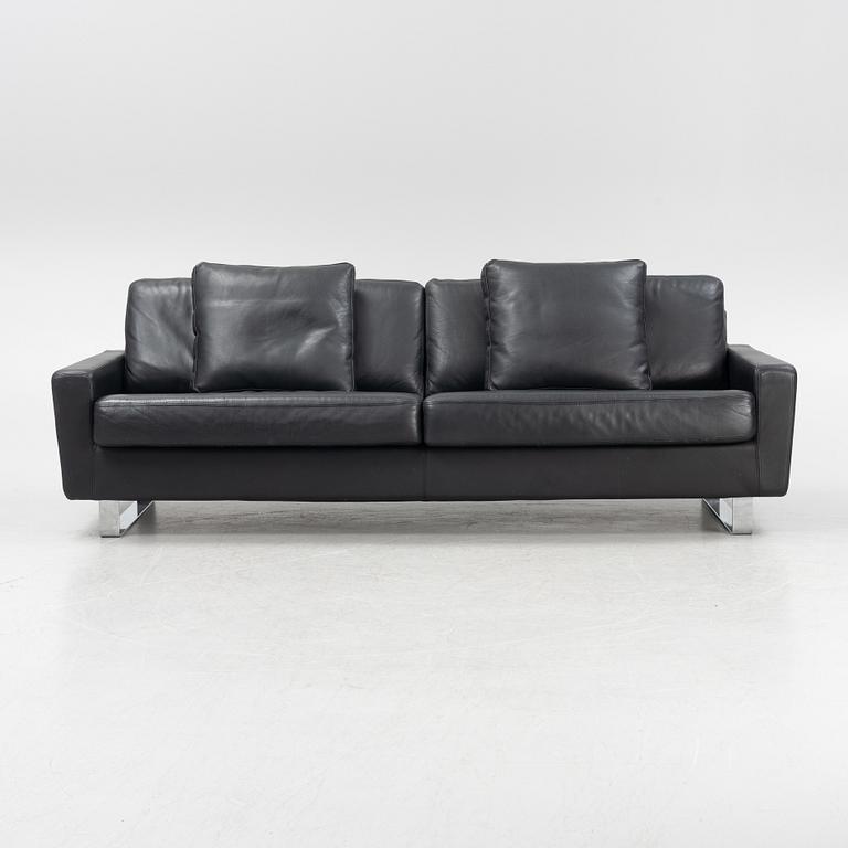 A leather upholstered sofa, Dux, 21st Century.