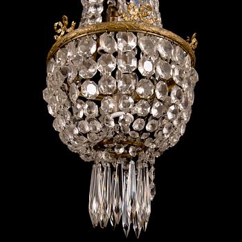 An early 20th century cut glass chandelier.