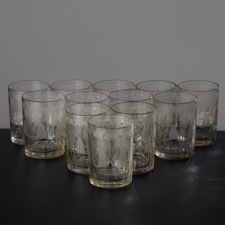 A set of 12 engraved glasses, 19th Century.