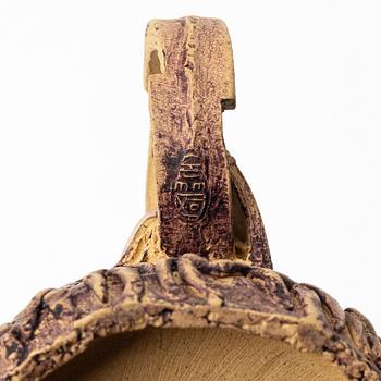 A group of three bright yellow yixing 'Gongfu' teapots, China, 1990s.