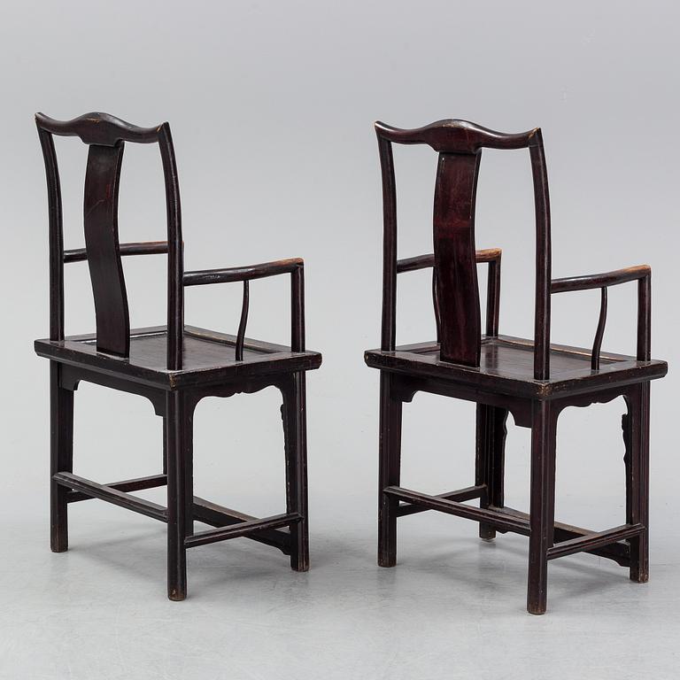 A pair of early 20th century Chinese armchairs.