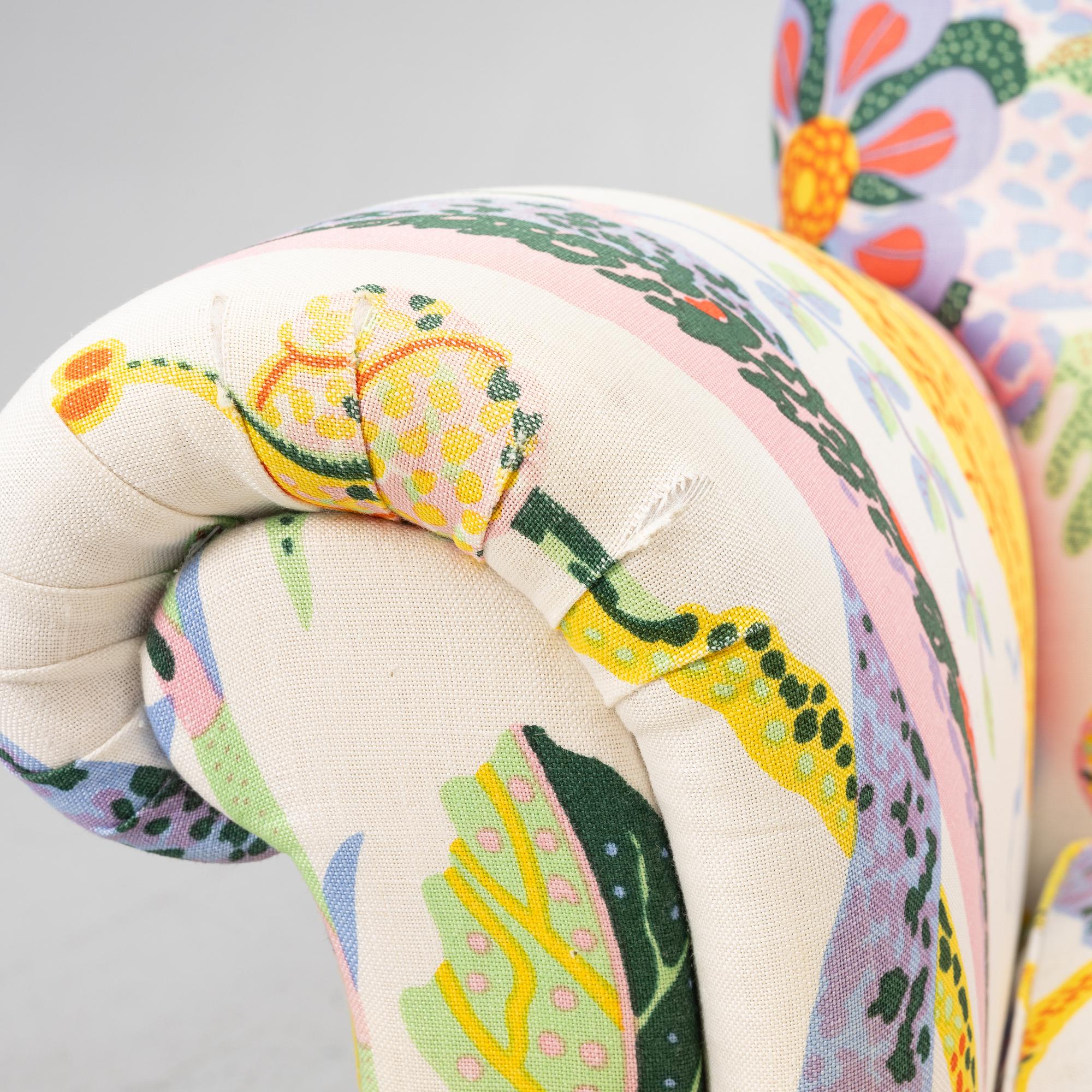 Josef Frank, armchair with footstool, model 336, Svenskt Tenn.