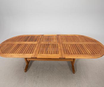 A 9 pcs stained teak garden suite by Brafab around 2000.