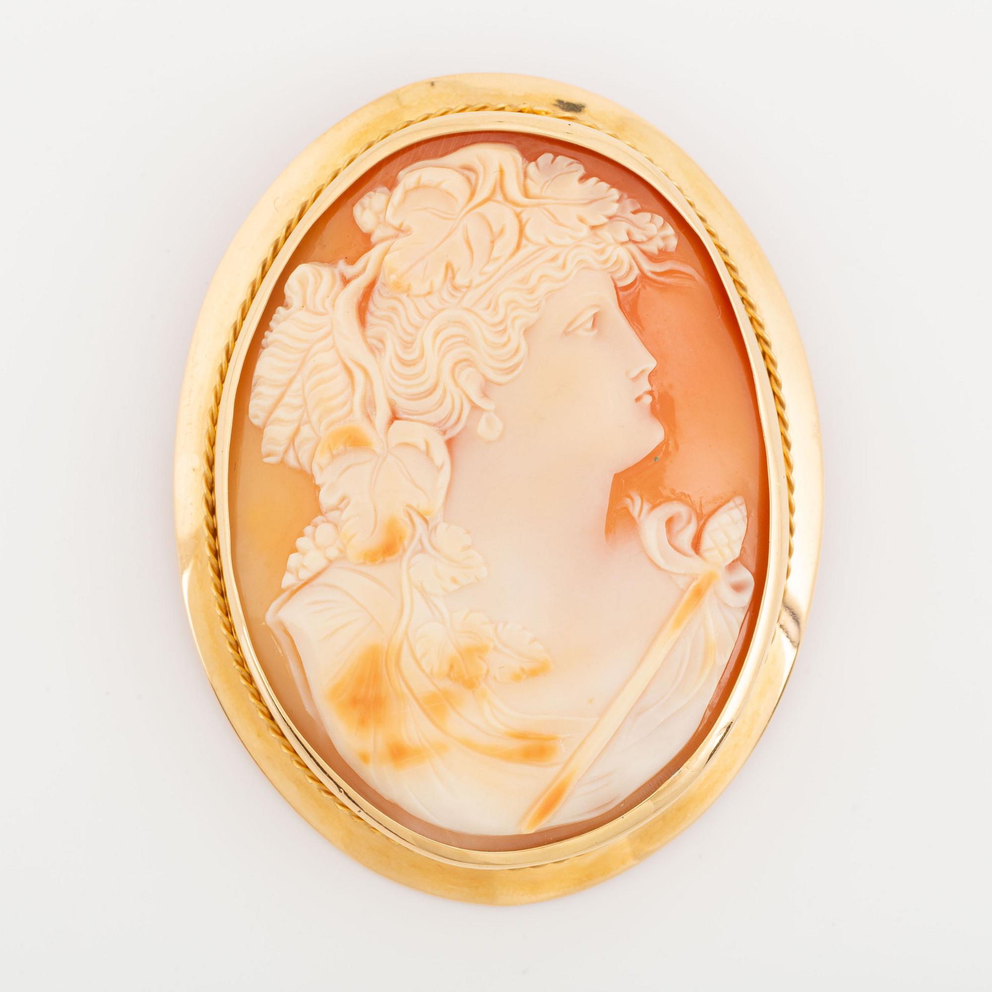 Brosch/hänge 18K guld med snäckskalskamé.