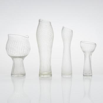 Tapio Wirkkala, four line-cut clear glass vases, signed Tapio Wirkkala Iittala.