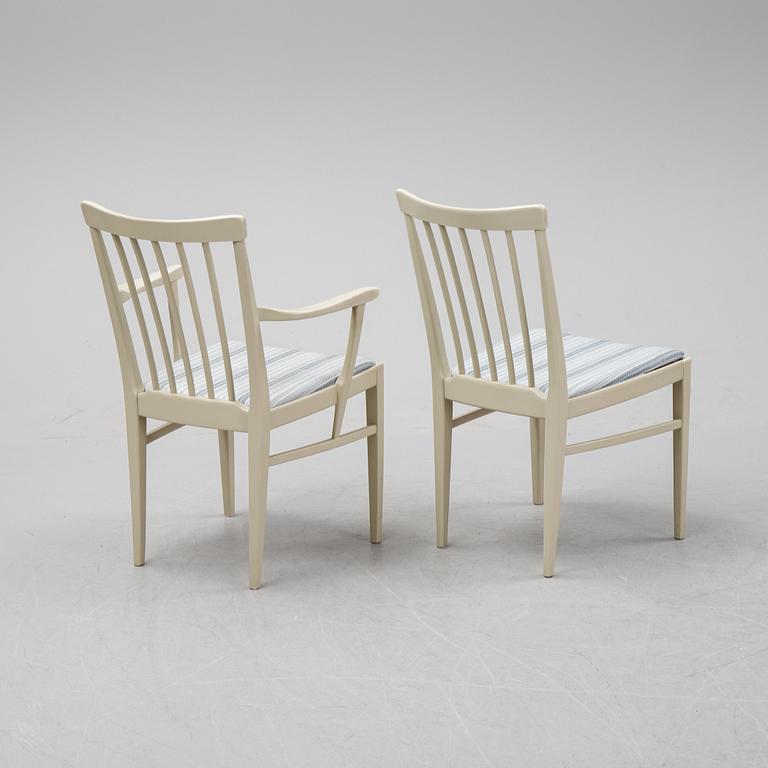 A dining table with two armchairs and six chairs by Carl Malmsten for Bodafors.