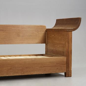 An Axel Einar Hjorth stained pine sofa 'Sandhamn', Nordiska Kompaniet 1933.