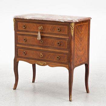 A Louis XVI style chest of drawers, mid 20th Century.