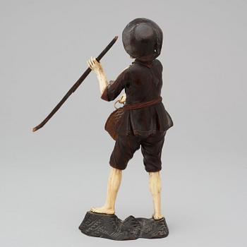 A German 18th century figurine in Simon Trogers manner.