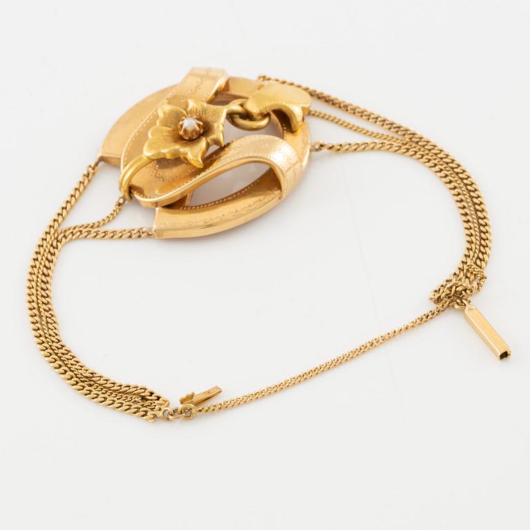 Bracelet 18K gold and a pearl.