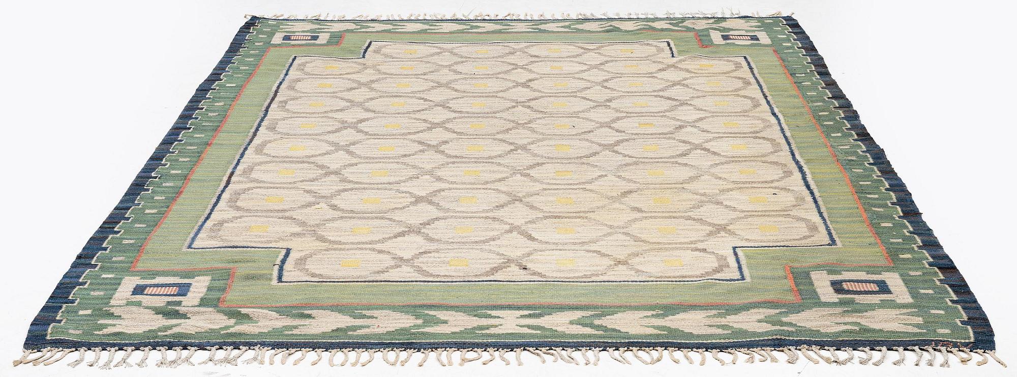 A carpet, flat weave, c. 340 x 246 cm, signed JBV (Johanna Brunssons Vävskola).
