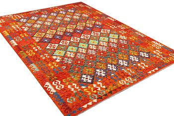 A Kilim carpet, c. 344 x 257 cm.