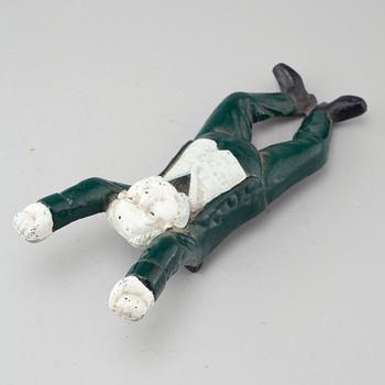 A 20th century cast iron boot jack.