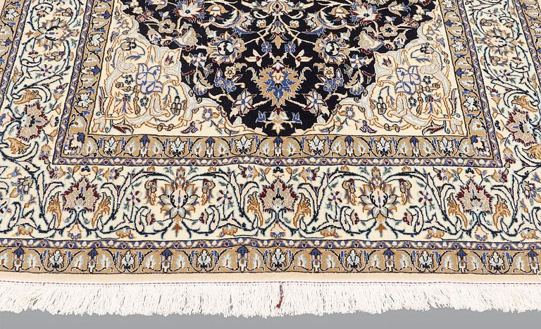 A carpet, Nain Part Silk, sk 9 LAA, ca 244 x 155 cm.
