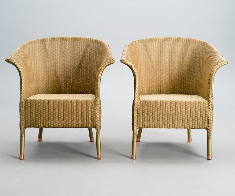 A PAIR OF ARM CHAIRS, Lloyd Loom, Spalding, England, turn of the 21st century.