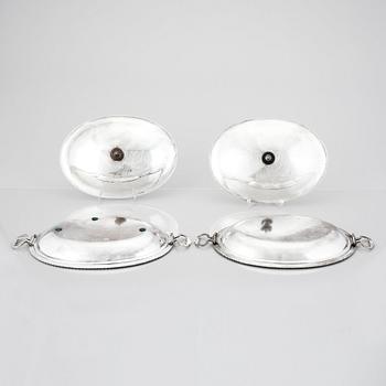 A pair of 18th Century dishes and cover, mark of Andrew Fogelberg, London 1772.